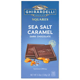 GHIRARDELLI sea salt caramel square closeup highlighting silky caramel balance
