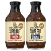 G Hughes Sugar Free Hickory BBQ sauce bottle on wood table for smoky grilling.