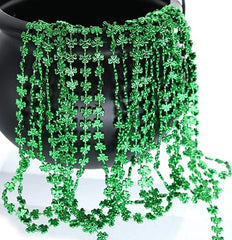 GiftExpress green shamrock beads in a lively party scene enhance color impact.