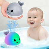 Gigilli rechargeable whale bath toy with water spray and lights for engaging bath time.