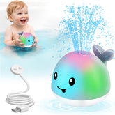 Gigilli whale bath toy light-up in action during bath time, engaging colors