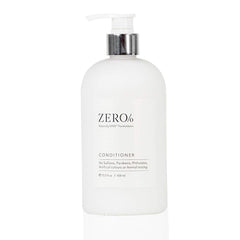 Gilchrist & Soames Zero Percent Conditioner bottle on a bathroom shelf for silky hydration.
