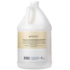 Ginger Lily Farms fragrance-free conditioner being poured for sensitive skin