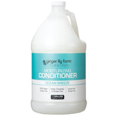 Ginger Lily Farms Club & Fitness Ocean Breeze conditioner bottle for weightless hydration.