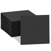 Ginkgo 2-ply black cocktail napkins folded for elegant table settings.