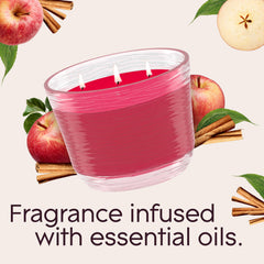 Glade 3-Wick candle bright flame and strong fragrance for gatherings.