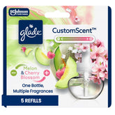 Glade PlugIns Melon & Cherry Blossom refill bottle for customizable scent balance.