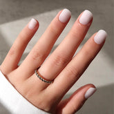 Glamnetic Cool Whip nails with glossy milky white finish for versatile daytime wear.