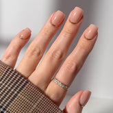 Glamnetic Goal Setter nails closeup shows a sleek nude finish for everyday wear.