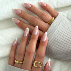Glamnetic Mother Pearl nails with a pearlescent glazed French tip for a polished manicure.