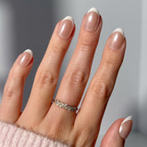 Glamnetic Pearlfect nails with pearlescent French tips for a salon-ready finish.