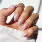 Glamnetic Polar Day nails with lilac ombre tips for a chic, long-lasting finish.