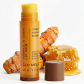 Glo Melanin lemon-turmeric lip balm tube delivering brightening and hydration.