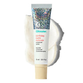 Glossier Balm Dotcom hydrating lip balm in a 15ml tube provides all-day moisture for lips.