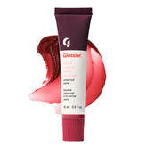 Glossier Balm Dotcom hydrates lips with berry burgundy tint for everyday wear.