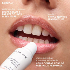 Glossier Balm Dotcom's non-greasy texture glides on lips.