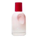 Glossier You bottle close-up showcasing minimalist design for daily wear.