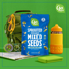 Go Raw organic sprouted watermelon seeds close-up highlighting plant-based protein crunch.