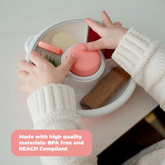 GoBe Kids Snack Spinner with hand strap for easy carrying during outings.