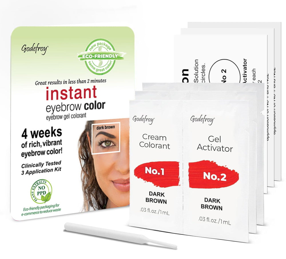 Godefroy brow color in dark brown during step 1 application shows precise, mess-free tint.