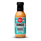 Gojo Miso Ginger Dressing bottle pour enhances hibachi-inspired greens
