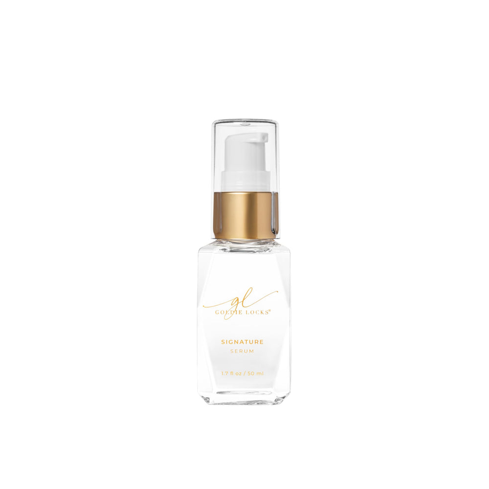Goldie Locks Signature Serum bottle pouring for effortless frizz control