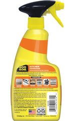 Goo Gone Degreaser applied to stove hood with foaming action