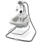 Graco DuetConnect LX swing seat with portable bouncer carry handles for easy room-to-room use.