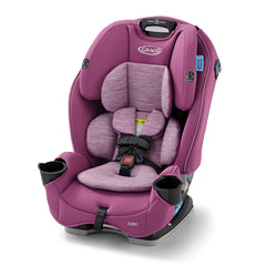 Graco SlimFit rear-facing harness in use, space-saving design for compact cars.