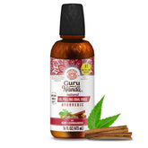 GuruNanda Cinnamon Oil Pulling Mouthwash bottle on countertop with fresh aroma
