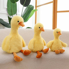 Gwxqybfe plush duck with orange beak and green eyes for cheerful decor.