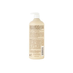 Hairitage Outta My Hair bottle pour demonstrates easy rinsing with gentle cleansing.