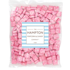 Starburst All Pink close-up shows juicy pink fruit chews perfect for snacking.