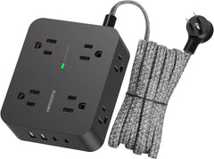 HANYCONY power strip with eight outlets and four USB ports powering multiple devices at once.