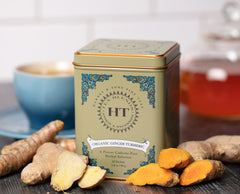 Harney & Sons HT organic ginger turmeric tea brewing hot with steam.