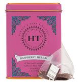 Harney and Sons Raspberry Herbal tisane tin front, a vibrant caffeine-free option for entertaining.