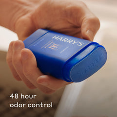 Packaging variations of Harry's deodorant in Redwood scent
