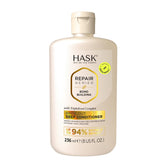 HASK Bond-Building rinse-out conditioner bottle highlights triple bond complex for repaired strands.