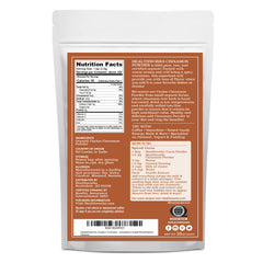 Healthworks Ceylon Cinnamon Powder poured from spoon for easy mixing in beverages.