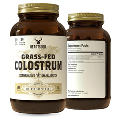 Heart & Soil colostrum capsule bottle close-up promotes gut health support.