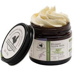Hearth and Homestead lavender peppermint balm bottle on wood, provides daily moisture.