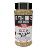 Heath Riles BBQ Garlic Jalapeño bottle pour shows bold seasoning for quick flavor boosts.