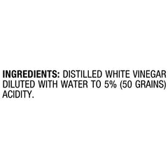 Closeup of HEINZ distilled white vinegar bottle showing labels and clarity.