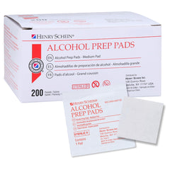 Henry Schein alcohol prep pads close-up showing compact size for precise skin cleansing tasks.