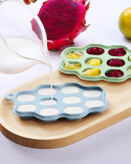 HEOMOONE green-lid freezer tray demonstrates stackable design for tidy fridge organization