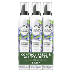 Herbal Essences Curl Boosting Mousse bottle delivering long-lasting hold