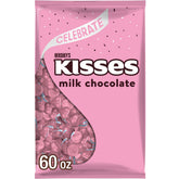 Hershey's KISSES milk chocolate bulk bag in pink foils, ideal for party favors.