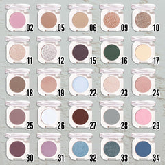 Swatch on eyelid illustrating a soft, smoky look with a matte finish.