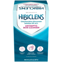 Hands applying Hibiclens foam for pre-procedure skin cleansing.
