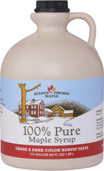 Hidden Springs Maple Dark Half Gallon bottle pouring over pancakes for breakfast.